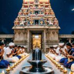 Worshippers praying during Maha Shivaratri at a Shiva temple.