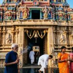 Penuganchiprolu Temple entrance with traditional South Indian architecture and devotees.